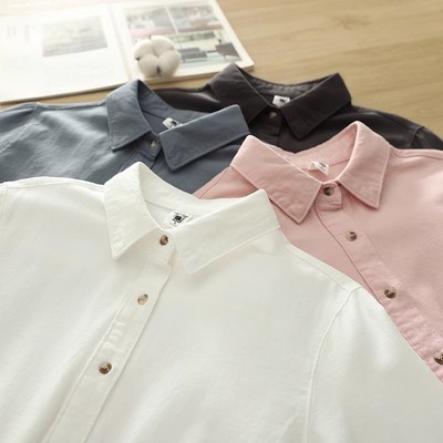 单排扣棉气质尖领纯色长袖衬衫女