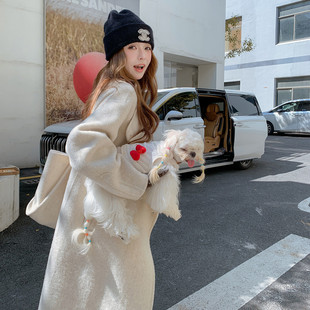 慵懒风大衣女2025新款燕麦色中长款气质外套