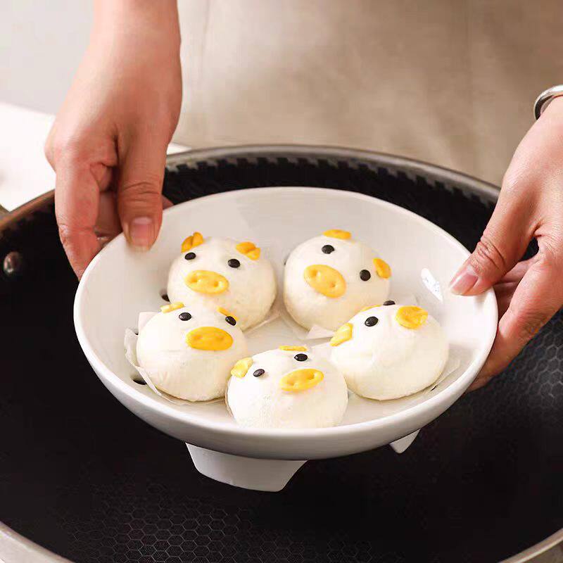 陶瓷多孔高脚蒸盘微波炉饺子盘图片