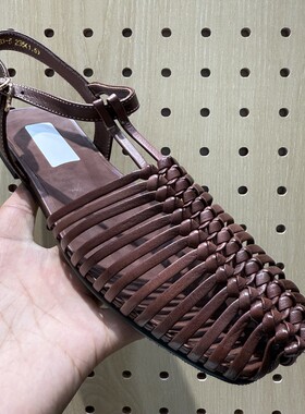 欧洲站女鞋2026夏季新款真皮编织包头凉鞋女平底罗马鞋
