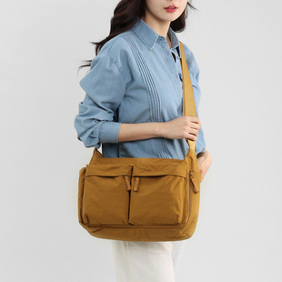 韩版文艺风中性休闲简约斜挎布包通勤百搭防泼水男女款ipad包学生