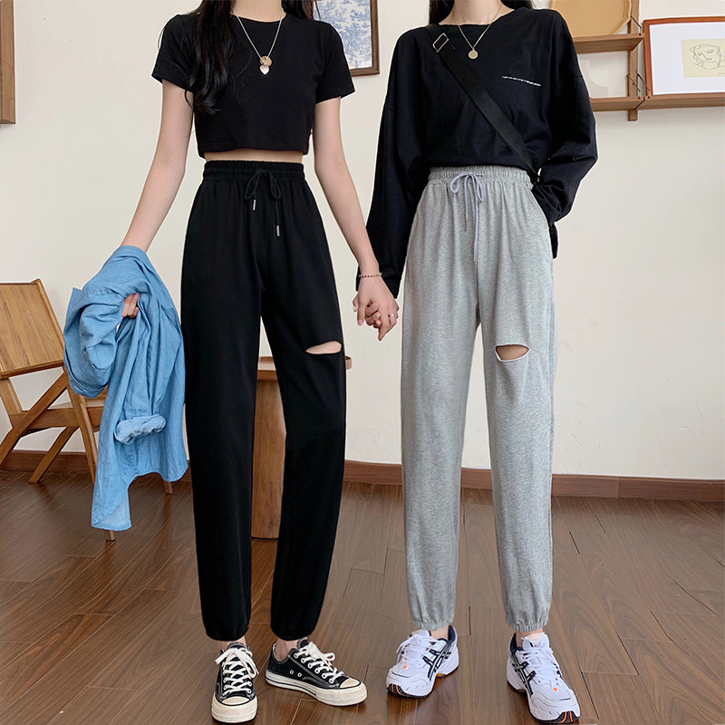 Real photo of 2021 spring sports pants women's thin high waist close feet show thin casual small nine point perforated pants