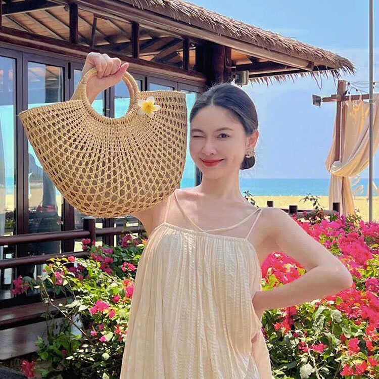 法式编织草编包海边度假沙滩包包文艺小众镂空手提新款女包