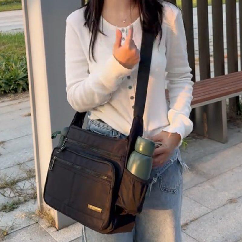 双侧可装水杯雨伞男式外出单肩斜挎杂志11寸平板外出逛街旅游大包