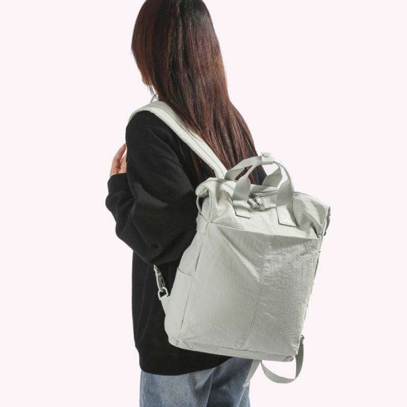 2025轻文艺防泼雨水杯位校园男女双肩背大学生书包14英寸电脑潮包