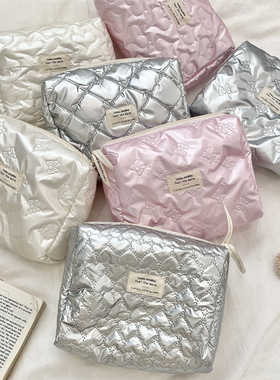 ins风蝴蝶结pu夹棉杂物收纳袋化妆包外出手拿包随身补妆袋