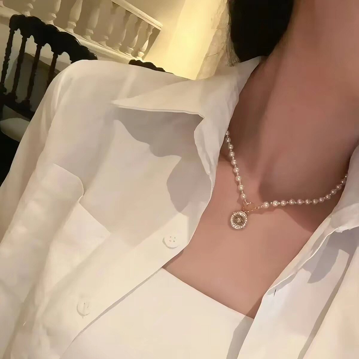 星语纽扣施家珍珠项链女款小众配饰毛衣链夏季轻奢感颈链饰品
