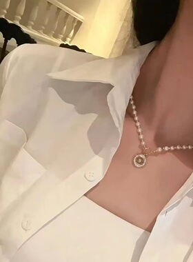 星语纽扣施家珍珠项链女款小众配饰毛衣链夏季轻奢感颈链饰品