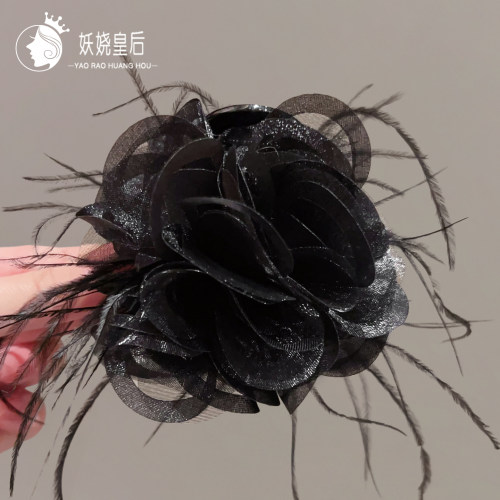 山茶花羽毛抓夹女高级感百搭