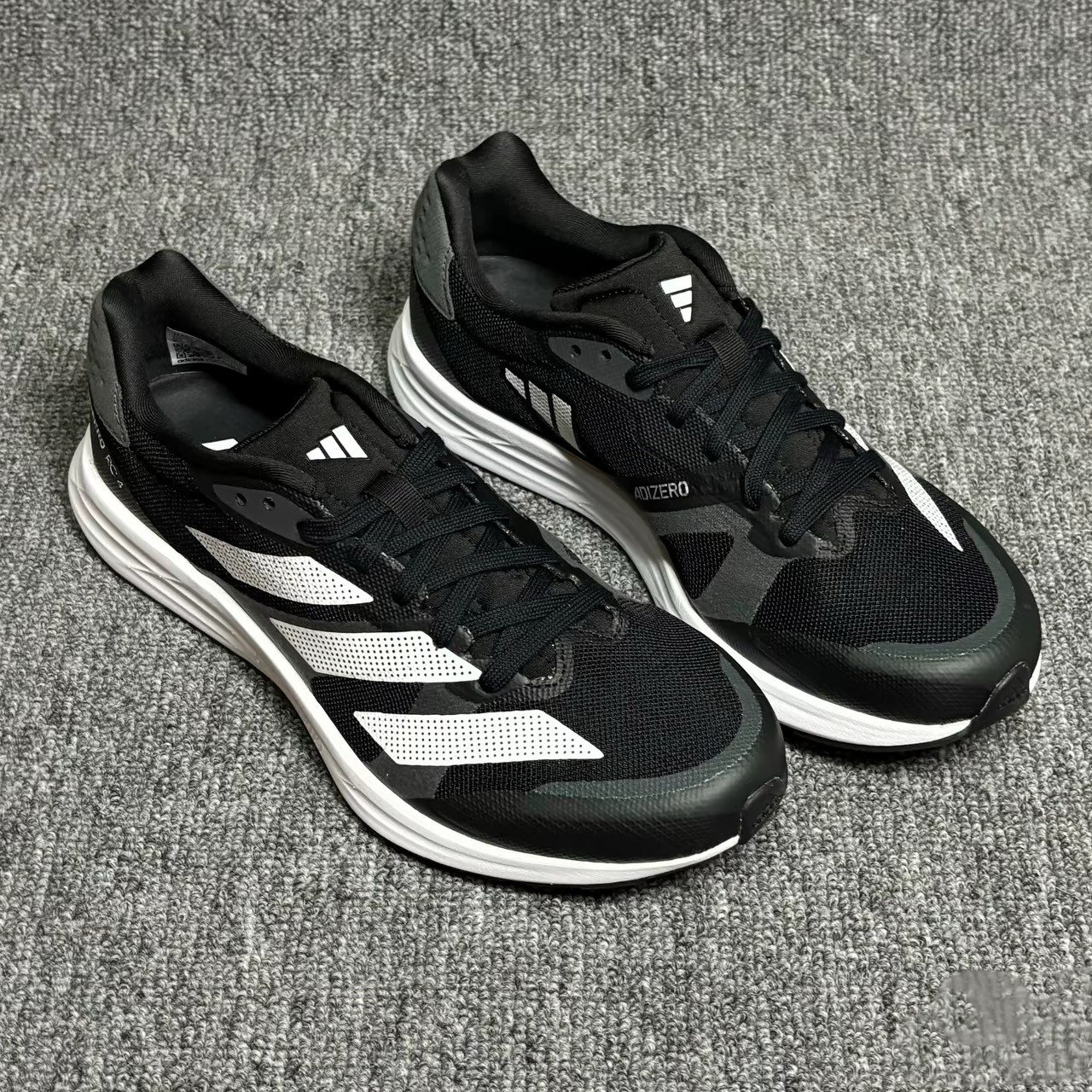 Adidas/阿迪达斯AdizeroRC4男子轻便透气减震训练跑步鞋GX8153