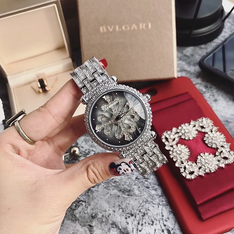 蒂米妮 女款女表镶钻表带紫色大气腕表 时尚会转动女士女款手表