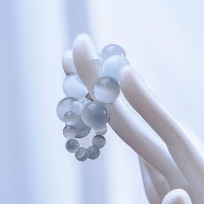 简修行白猫眼石手捻手机链挂件