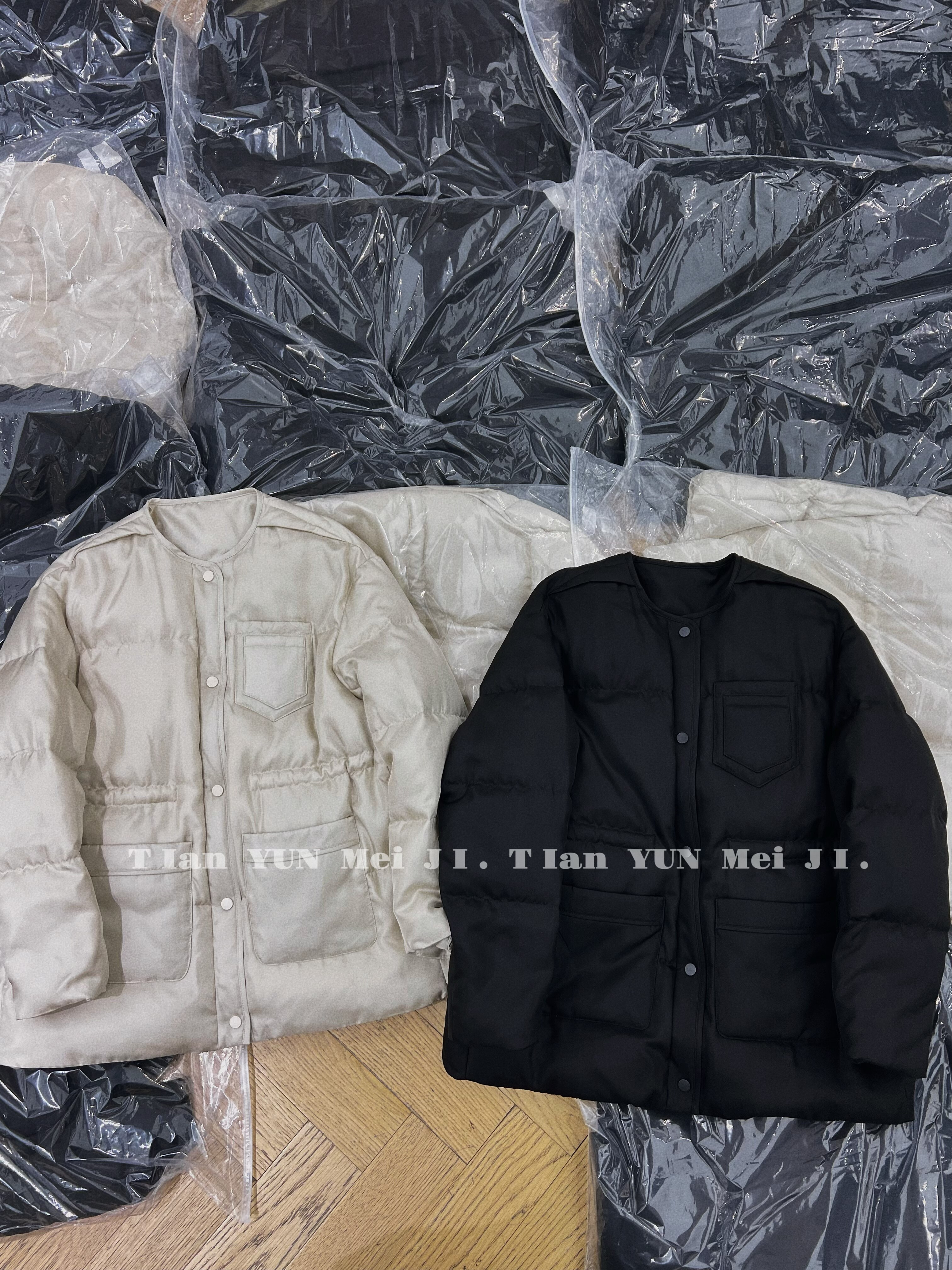 欧洲站25冬季新款韩系简约宽松无领收腰桑蚕丝白鹅绒羽绒服外套女