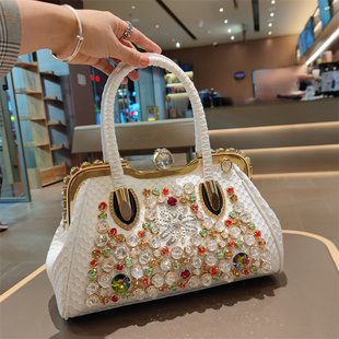 高级感轻奢真皮包包女2026新款镶钻时尚气质休闲斜挎单肩手提锁扣