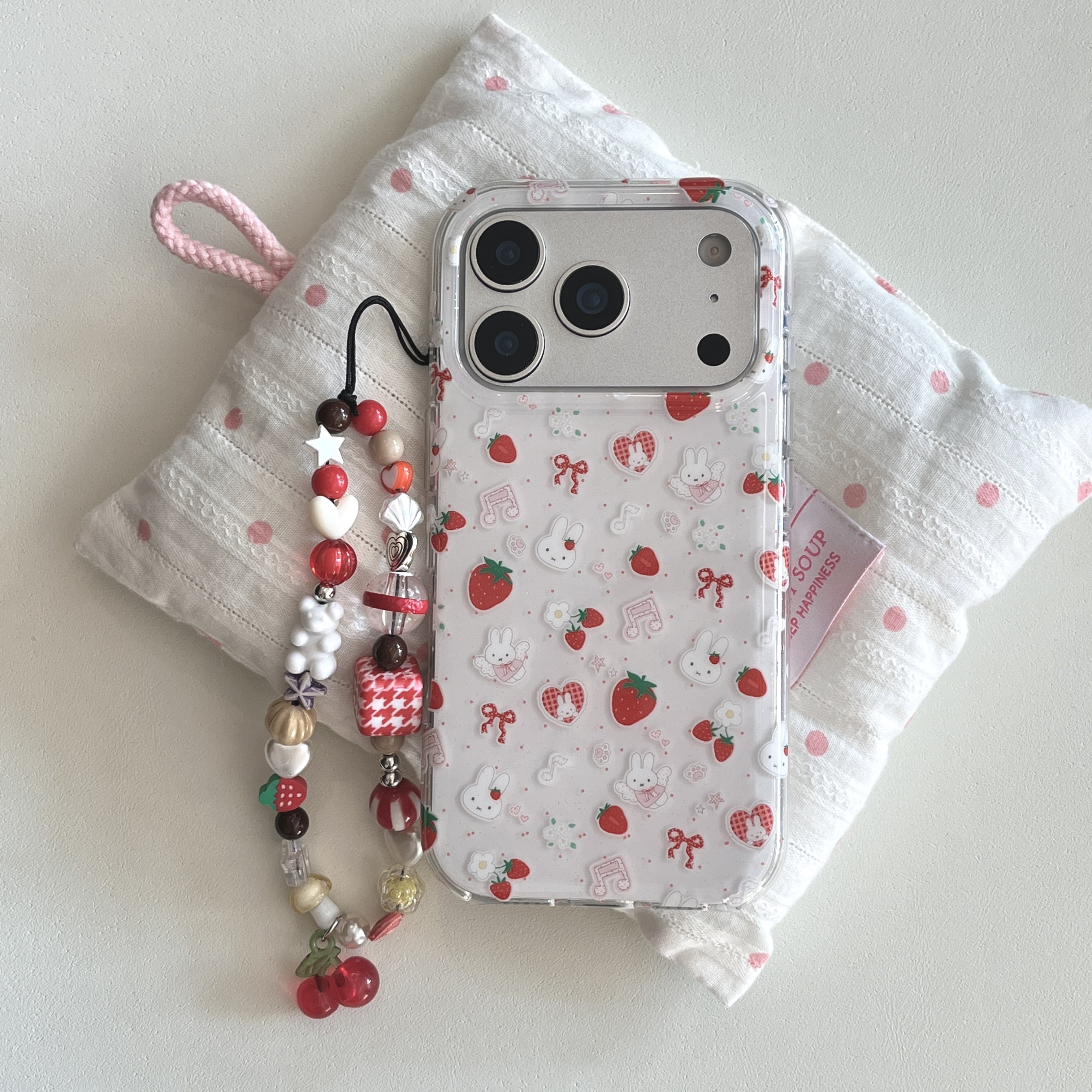 圆弧气囊IMD卡通可爱小草莓音符米菲兔手机壳适用iphone17promax大孔防摔苹果16亮面15趣味创意14手链13女生