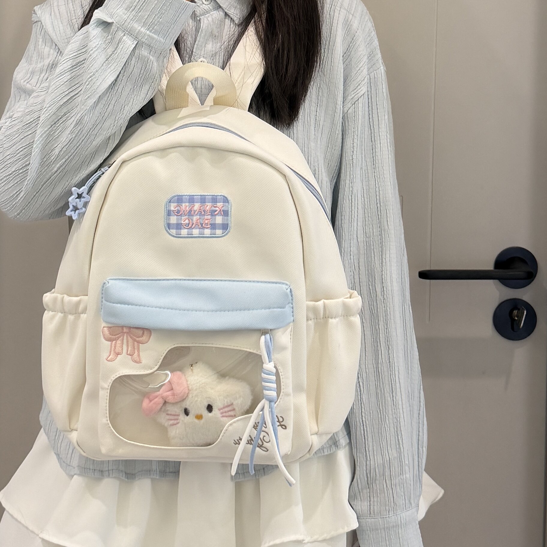 高颜值蝴蝶结吧唧痛包 ins风透明娃包少女双肩包可爱校园学生书包 - 实物图