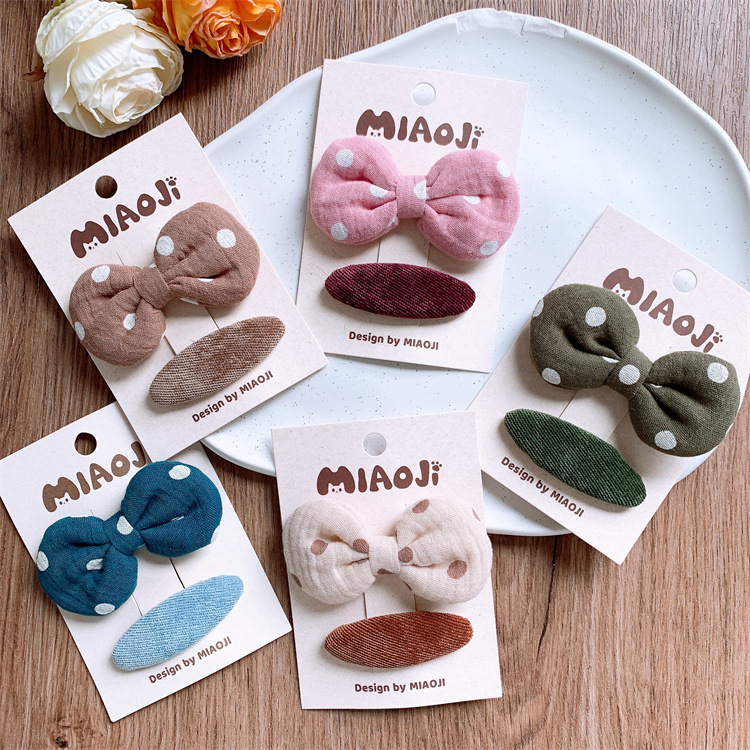 新款儿童圆点布艺蝴蝶结发夹纯色椭圆碎发BB夹女童侧边刘海夹发卡