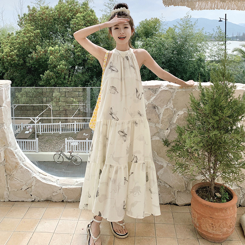 2024夏季新款宽松法式度假风仙女长裙米白色印花无袖挂脖连衣裙女