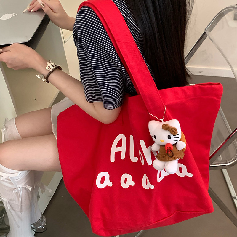 小众设计红色帆布包女2026新款慵懒风大容量单肩包通勤百搭托特包