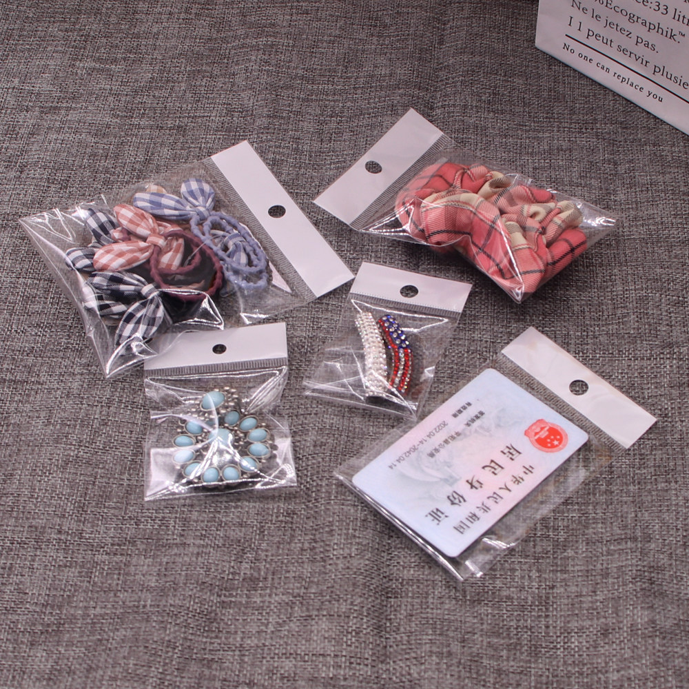 100个双面9丝opp自封袋耳环项链饰品包装袋白色珠光膜卡头自粘袋