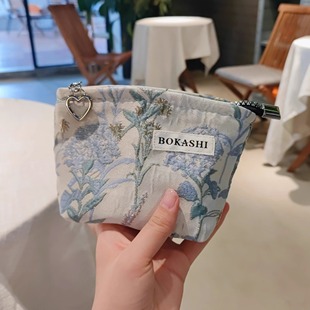 高端小化妆包女零钱包大容量便携式 2025新款 高级感外出旅行收纳包