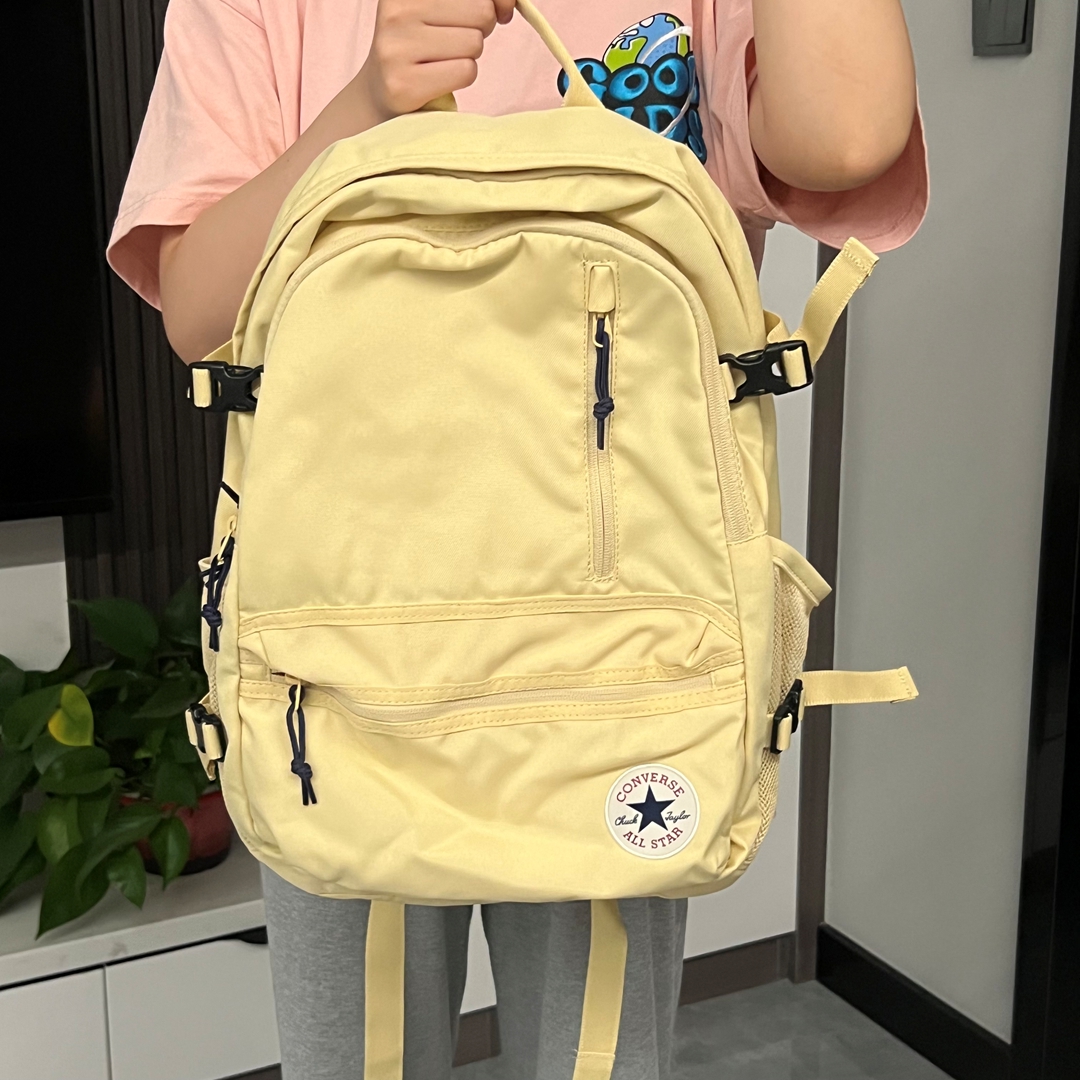 匡威休闲大容量男女奶油黄双肩包