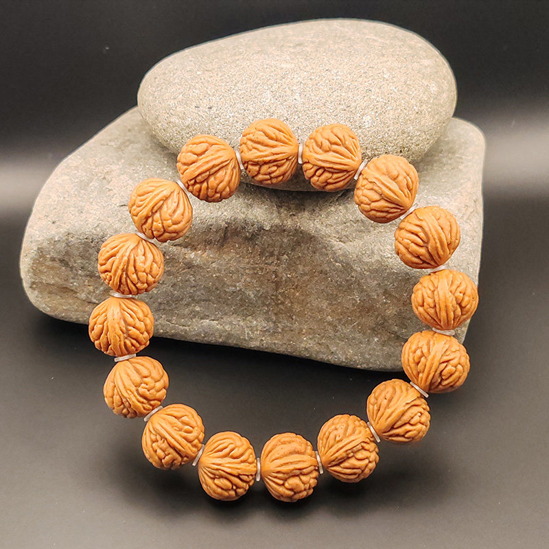 野生龙纹山桃核玉龙脊手串秦岭同树玉玲珑高端男女同款文玩珠串
