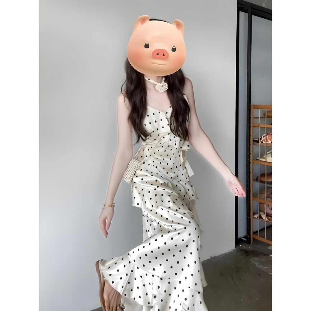 纯欲风波点吊带连衣裙不规则夏季收腰显瘦法式绝美荷叶边长裙子女