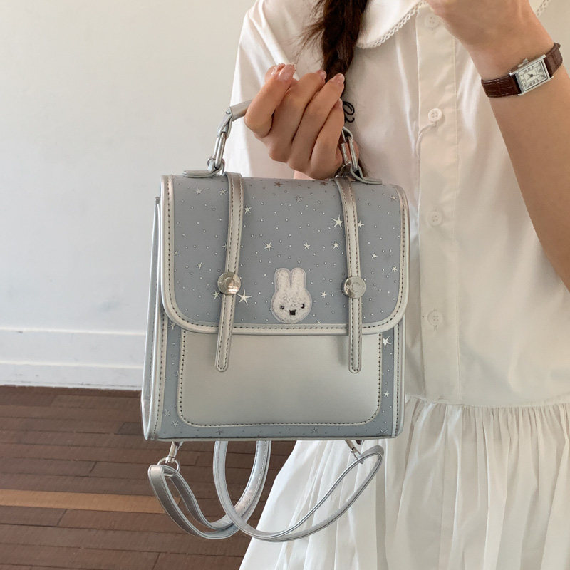 百搭星星波点双肩包女2026新款学院风斜挎夏季简约多用双肩包