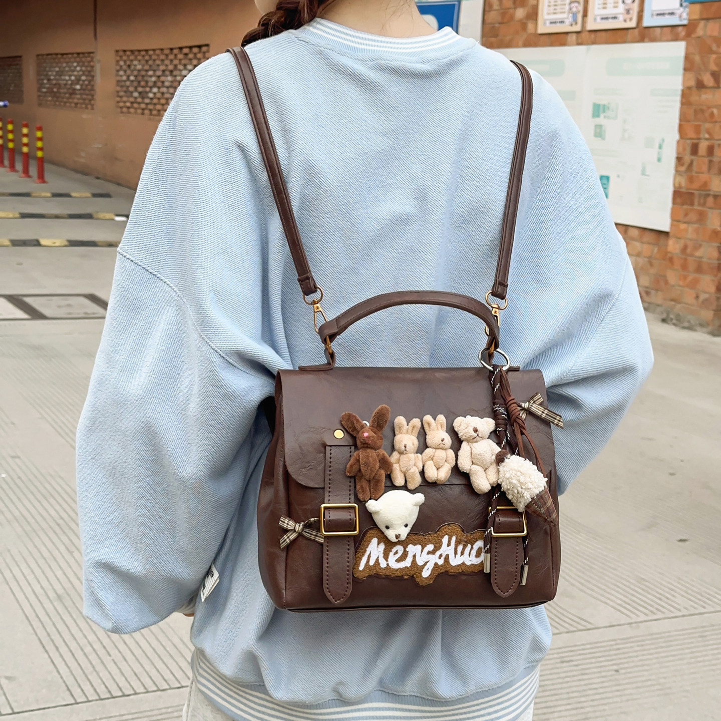 美式小众可爱玩偶双肩包包女2025新款学院风手提斜挎包多功能背包