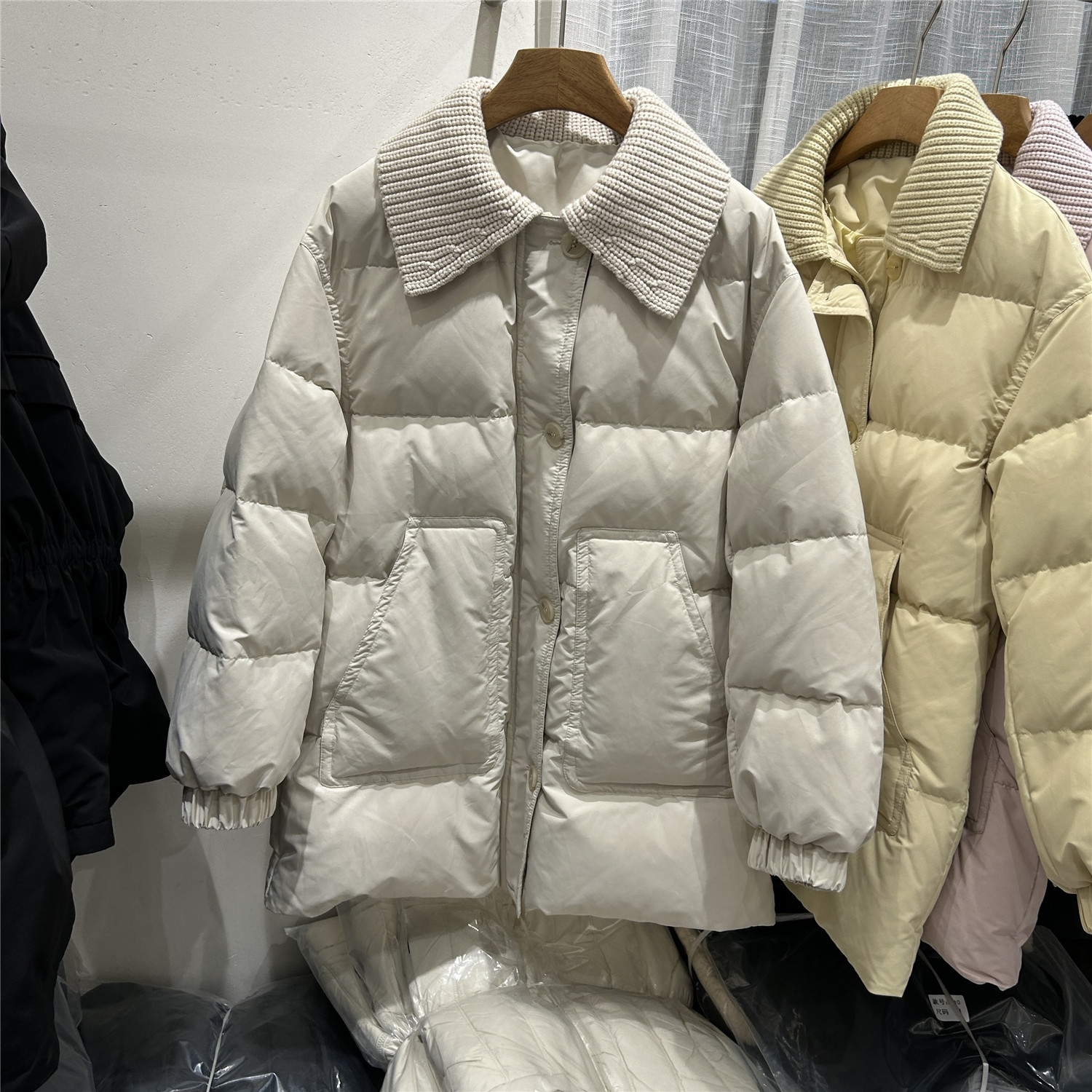 欧洲站欧货设计感针织翻领羽绒服女中长款加厚保暖90白鹅绒外套