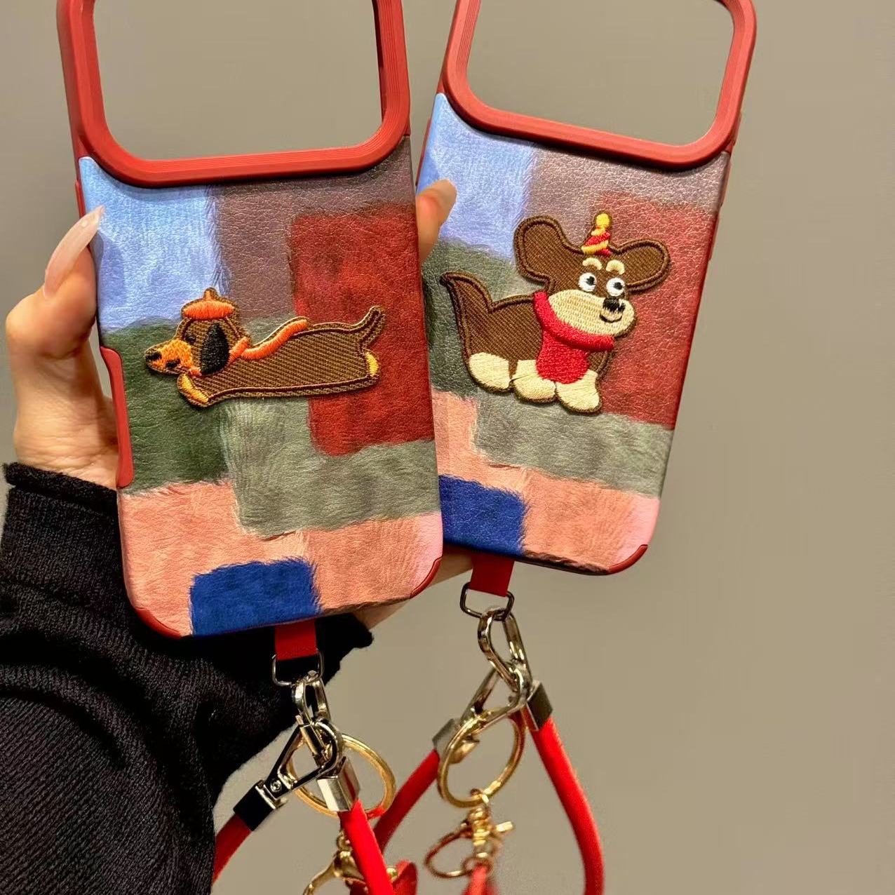 可爱撞色拼接刺绣小狗适用iphone17prom苹果15手机壳新款14pr皮纹小众简约设计感防摔保护壳