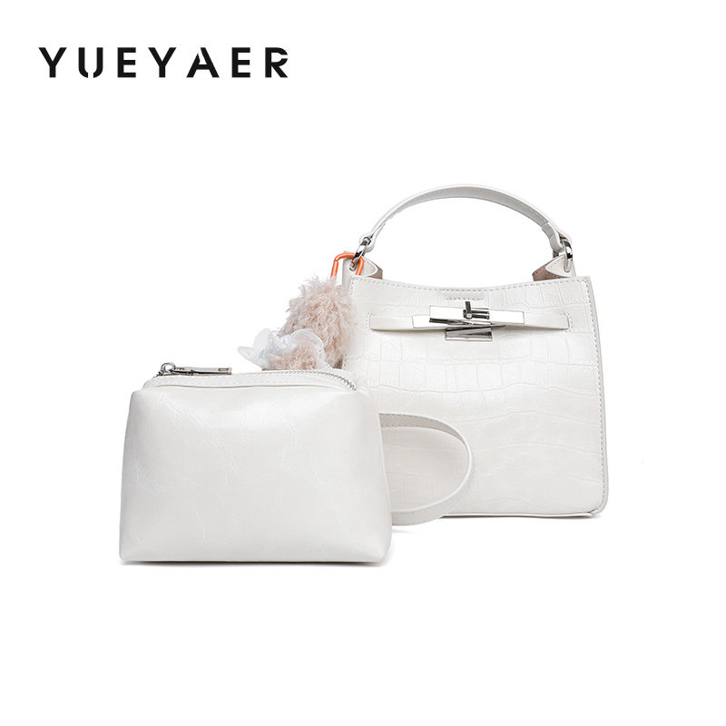 月芽儿通勤休闲水桶包女包2026新款手提包高级感纯色单肩斜挎包