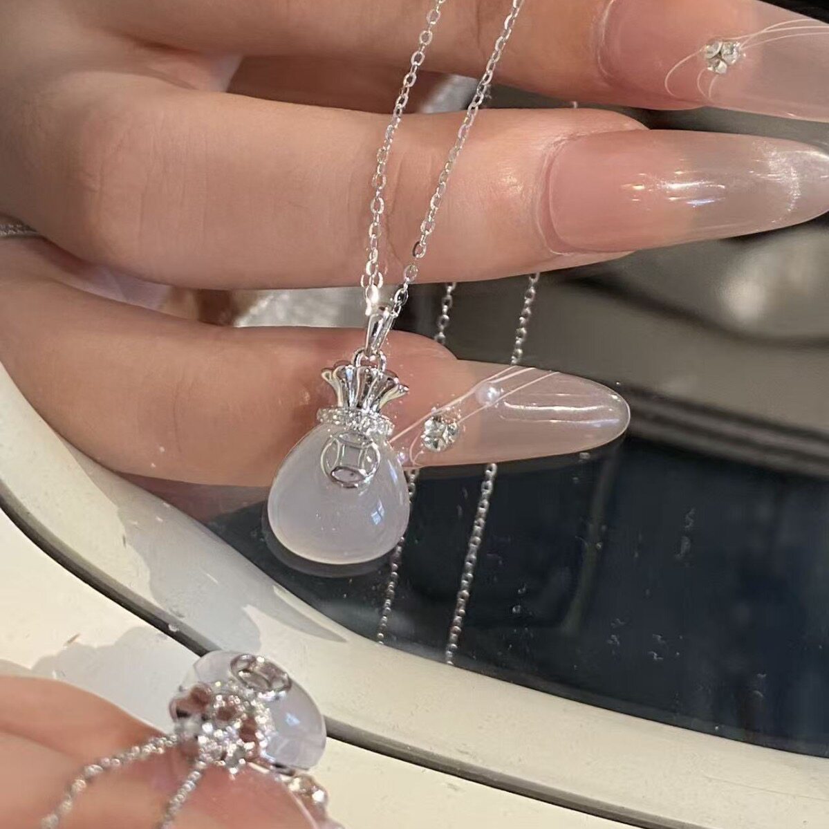 S925纯银冰种白玉髓福袋项链女招财钱袋轻奢小众锁骨链送女友礼物