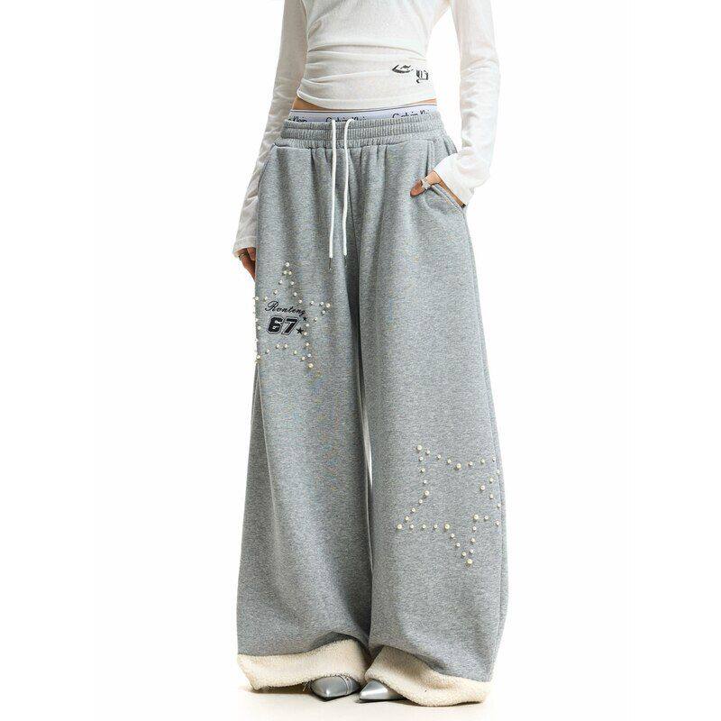 宽松美式新款毛绒潮男女外贸卷边钉珠阔腿裤刺绣重工弯刀2026卫裤