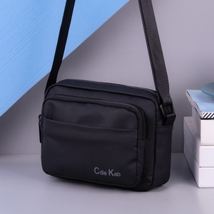 斜挎包男大容量2025新款牛津布小众轻便小包高级感迷你帆布手机包