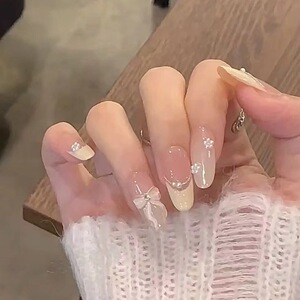 INS冰透奶白色蝴蝶结珍珠点缀高级感显白长款椭圆手工穿戴美甲贴