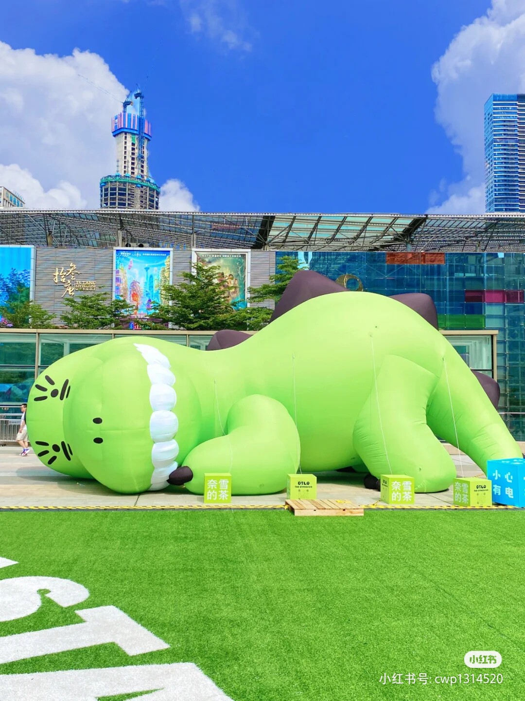 定制充气卡通恐龙气模绿色躺平的恐龙商场美陈户外草坪装饰道具