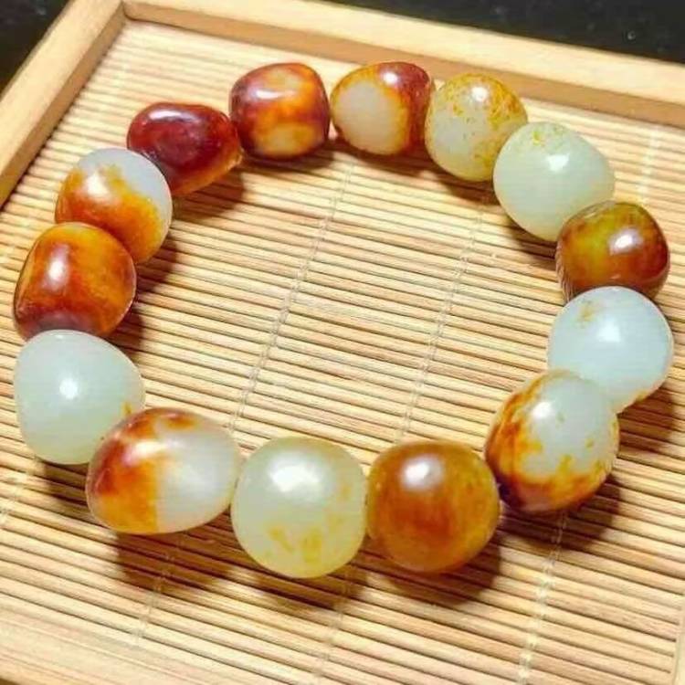 枣红皮白玉籽料原石手串手链