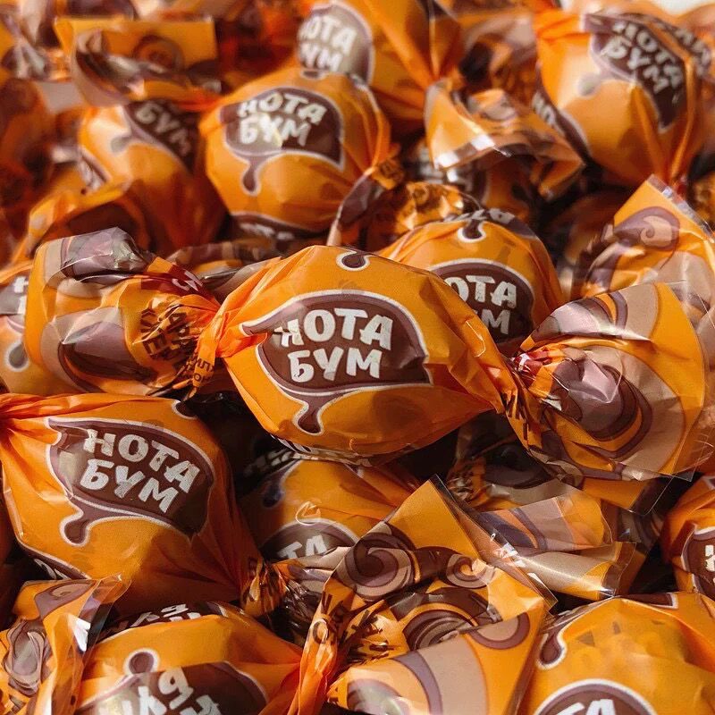 俄罗斯进口音符糖巧克力榛子酱夹心太妃软糖奶球糖果喜糖