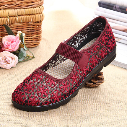 中年女士凉鞋2017新款夏季40岁50女妈妈老年人平底舒适平跟洞洞鞋