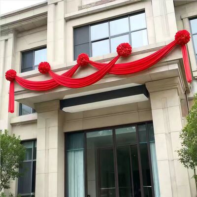 结婚农村庭院外墙布置装饰大红花球拉花红绸布婚房阳台栏杆别墅