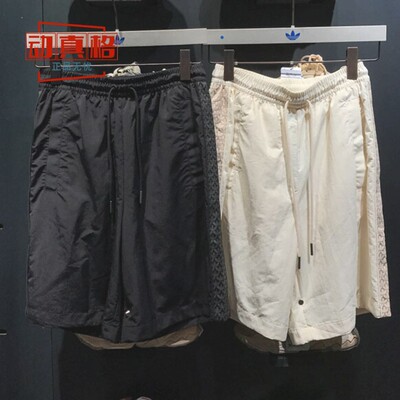 阿迪达斯三叶草男女裤满印Logo短裤梭织宽松运动裤 IN1047 IN1046