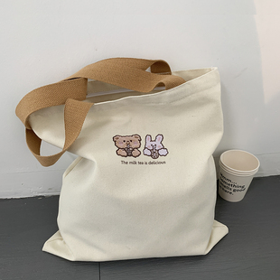 包包2026新款韩系卡通可爱帆布包女大容量简约通勤学生单肩托特包