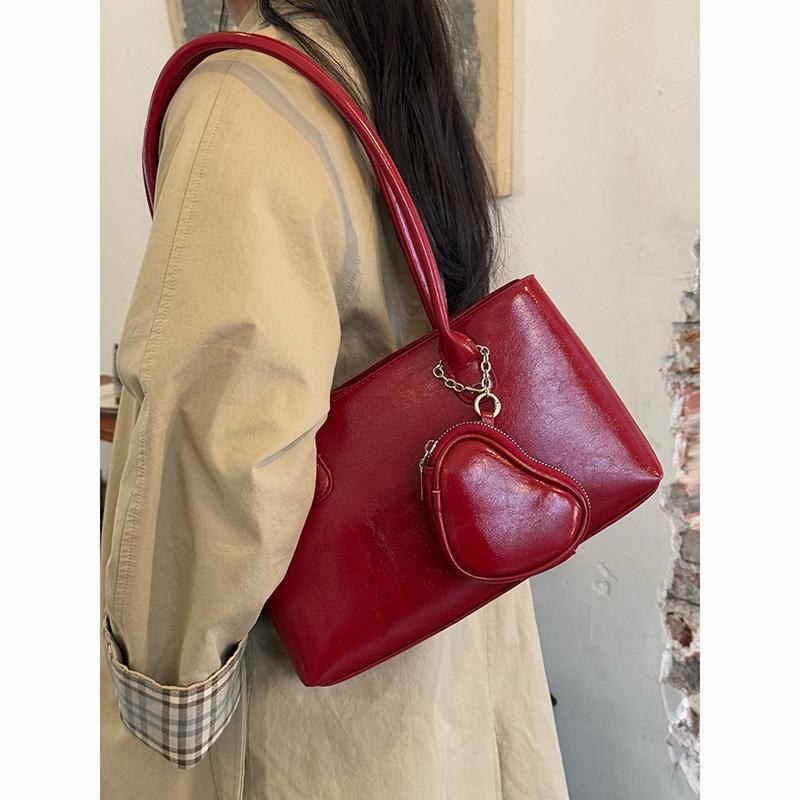 进口韩国小众高级感长柄单肩腋下包新款大容量爱心耳机包通勤托特