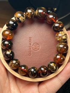 【特价】14mm+抚顺琥珀老珠超高桩血溶洞花蜡手串26.29克25年老珠