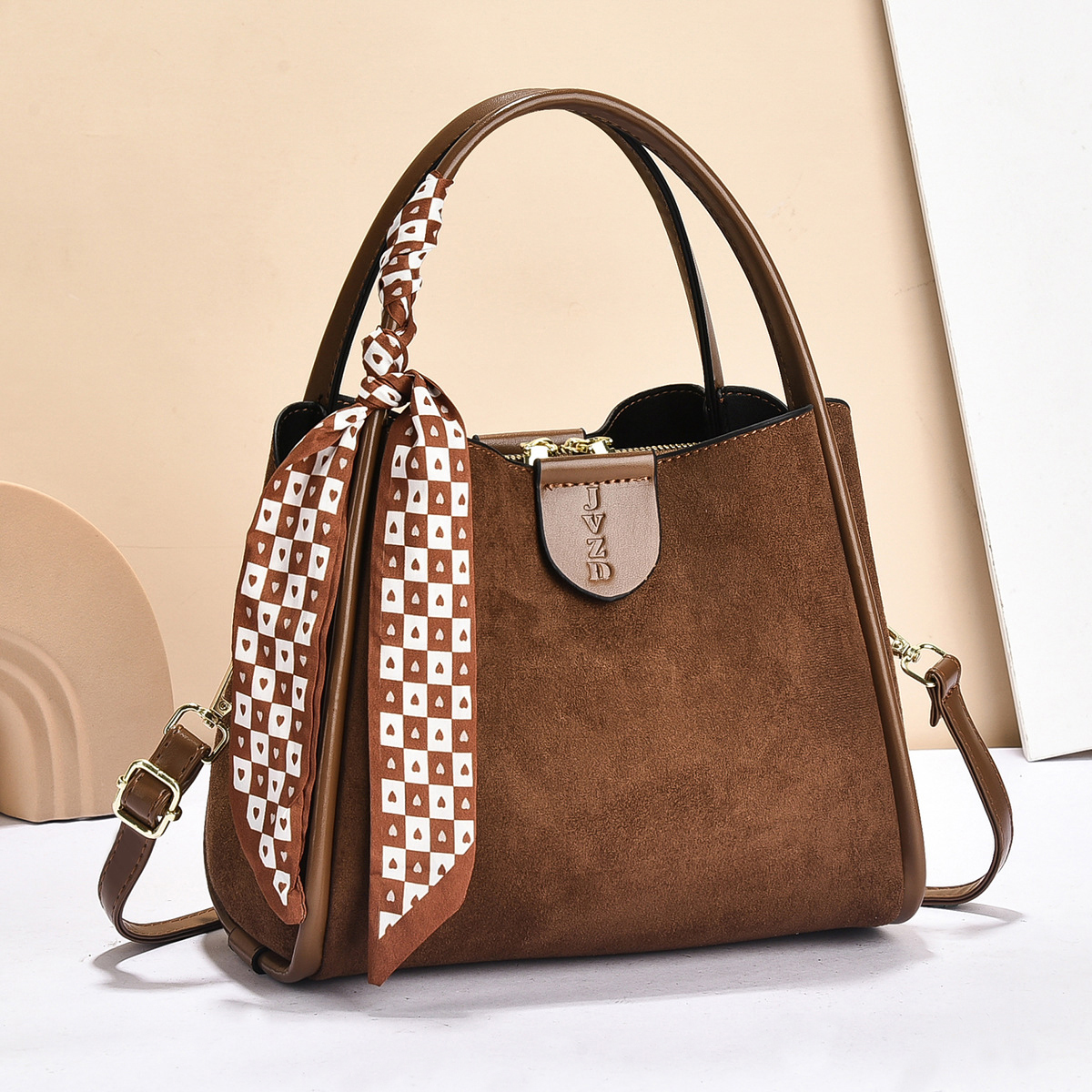 复古麂皮绒水桶包通勤百搭手提包