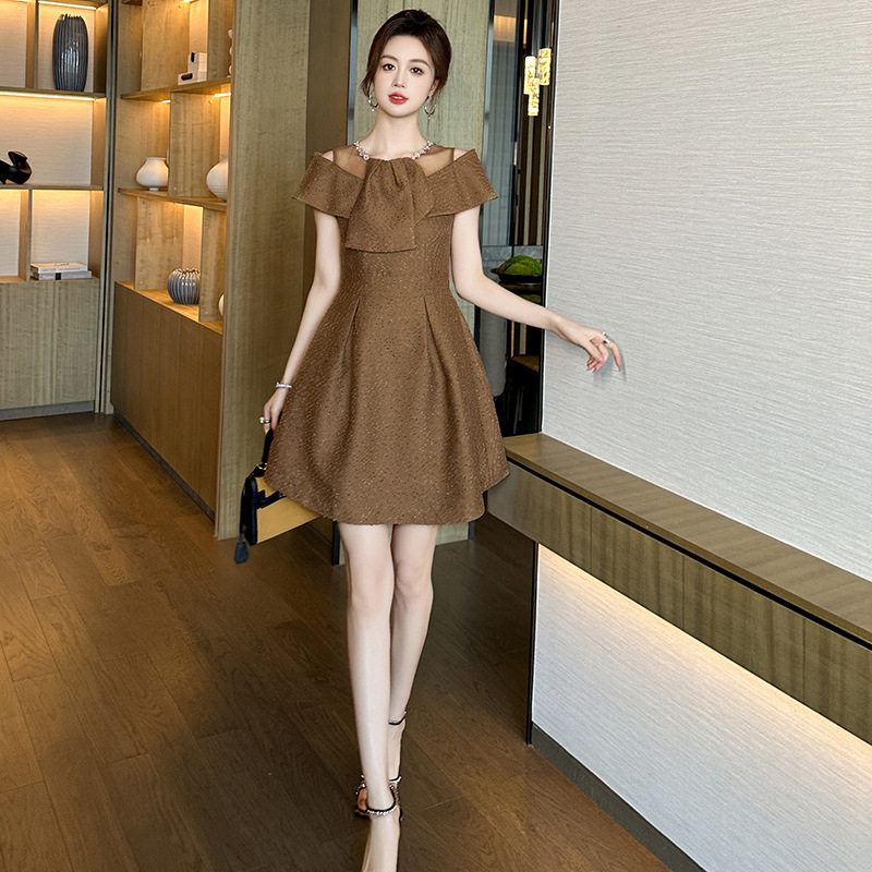 茶歇裙子2026夏季新款女装设计感圆领拼接收腰A字蓬蓬连衣裙30910