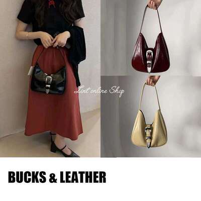 折扣 bucks & leather 牛皮亮面月牙型手提腋下包单肩包