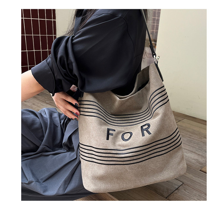 小众复古做旧帆布包水洗布水桶包大容量腋下包女士斜挎单肩子母包